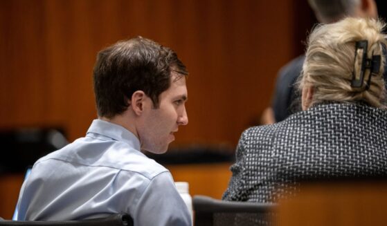Tyler Robinson speaks with his defense attorney Kathryn Nester during a hearing for Tyler Robinson, accused in the fatal shooting of Charlie Kirk, in 4th District Court on Friday, April 17, 2026, in Provo, Utah.