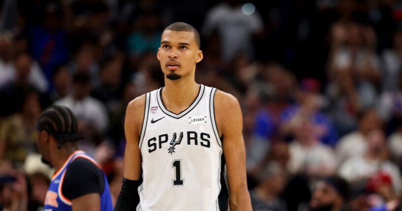 Victor Wembanyama of the San Antonio Spurs reacts during the fourth quarter against the New York Knicks in Game Five of the 2026 NBA Finals at Frost Bank Center on June 13, 2026, in San Antonio, Texas.