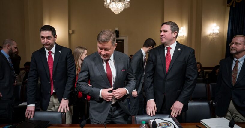 Montana Attorney General Austin Knudsen, Oklahoma Attorney General Gentner Drummond, Missouri Attorney General Andrew Bailey, and Frank O. Bowman III, professor emeritus of law, University of Missouri School of Law, arrive to testify before a House Homeland Security Committee hearing titled 