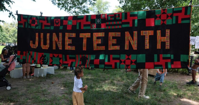 People attend a Juneteenth event in Brower Park on June 19, 2026, in the Crown Heights neighborhood of the Brooklyn borough in New York City.