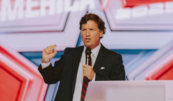 Conservative political commentator and podcast host Tucker Carlson speaks at Turning Point's annual AmericaFest conference, in remembrance of late right-wing political activist Charlie Kirk, in Phoenix, Arizona, on Dec. 18, 2025.