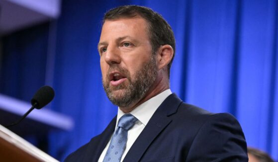 Secretary of Homeland Security Markwayne Mullin speaks during a press conference about safeguarding unaccompanied immigrant children at the Department of Justice headquarters in Washington, D.C., on June 11, 2026.
