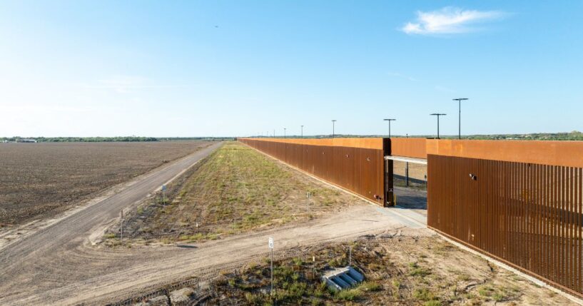 In an aerial view, a section of border fencing is seen on Oct. 15, 2025, in La Casita-Garciasville, Texas.