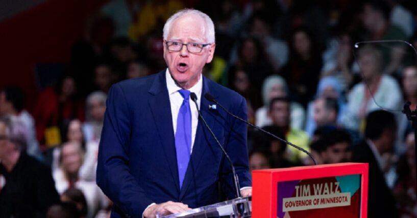 Minnesota Gov. Tim Walz, pictured speaking at a progressive political convention in Barcelona, Spain, in April.