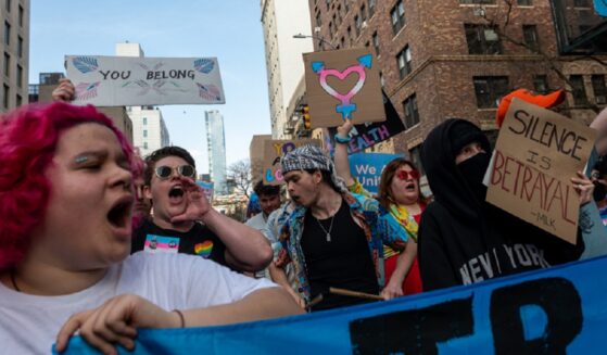 Activists march through Manhattan in March 2025 during a Trans Day of Visibility protest.