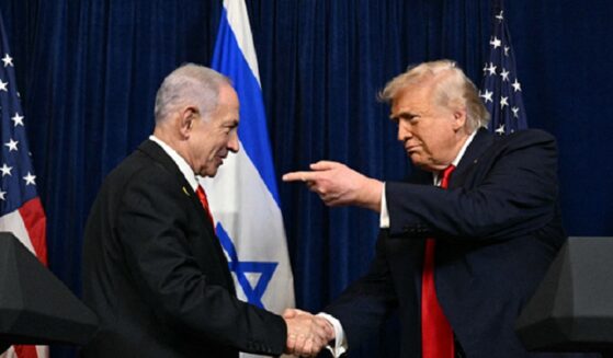 Israeli Prime Minister Benjamin Netanyahu and President Donald Trump shake hands during a December meeting at the Mar-a-Lago Club in South Florida.