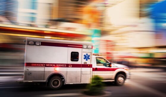 An ambulance races through Manhattan in a file photo from 2022.