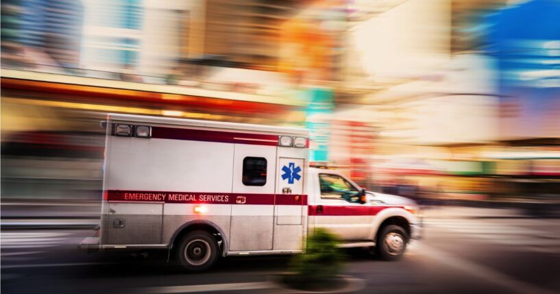 An ambulance races through Manhattan in a file photo from 2022.