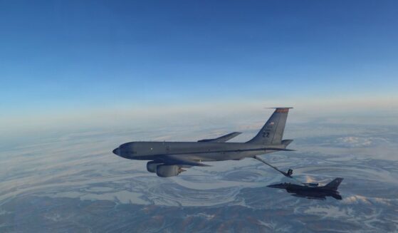 In this handout photo provided by the U.S. Department of War, a North American Aerospace Defense Command F-16 Fighting Falcon fighter refuels from a KC-135 Stratotanker over Western Alaska on Feb. 19, 2026.