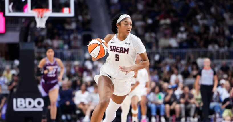 Angel Reese of the Atlanta Dream dribbles the ball through mid-court against the Toronto Tempo during the second half of their WNBA basketball game at the Coca-Cola Coliseum on July 17, 2026, in Toronto, Ontario, Canada.