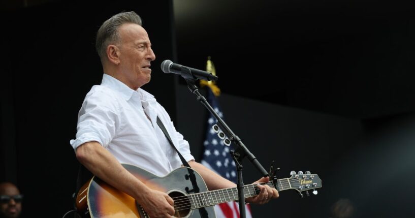Bruce Springsteen performs during the dedication ceremony for the opening of the Barack Obama Presidential Center in John Lewis Plaza on June 18, 2026, in Chicago, Illinois.