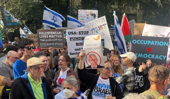 Anti-Israel demonstrators hold signs as Israeli Prime Minister Benjamin Netanyahu addresses the 78th UN General Assembly in New York on Sept. 22, 2023.