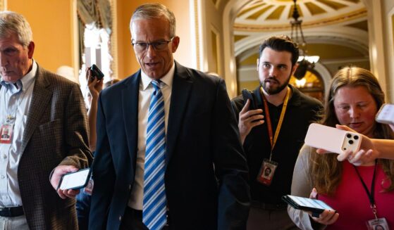 Senate Majority Leader John Thune walks from the Senate Chambers in the U.S. Capitol Building on July 23, 2026, in Washington, D.C.