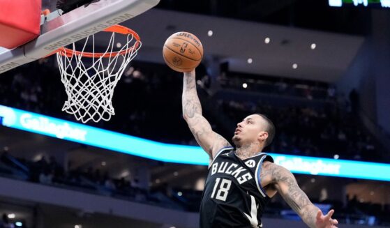 Kyle Kuzma of the Milwaukee Bucks scores a dunk during the first half of the game against the Memphis Grizzlies at Fiserv Forum on April 5, 2026, in Milwaukee, Wisconsin.
