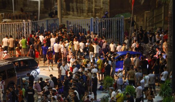 People gather at Bab Sebta on the Morocco-Spain border near Spain's enclave of Ceuta and the Moroccan town of Fnideq, on July 30, 2026.