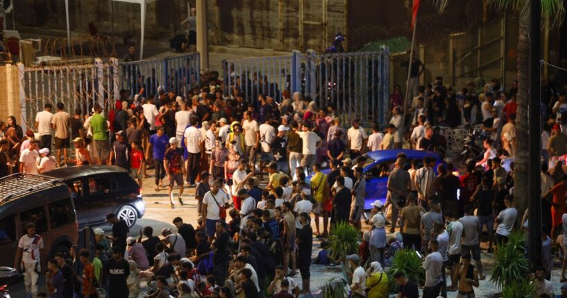People gather at Bab Sebta on the Morocco-Spain border near Spain's enclave of Ceuta and the Moroccan town of Fnideq, on July 30, 2026.
