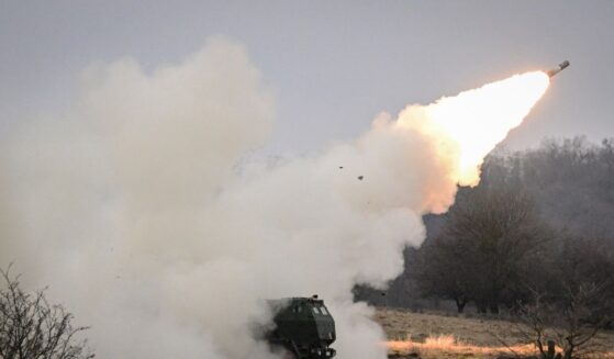 NATO soldiers operate a High Mobility Artillery Rocket System launcher during the Dynamic Front 26 exercise at the Cincu Training Area in Cincu, Romania, on Feb. 9, 2026.