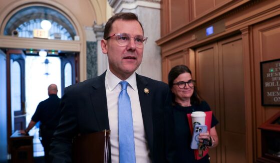 GOP Rep. Thomas Kean Jr. of New Jersey arrives at the U.S. Capitol Tuesday with his wife Rhonda Kean, right.