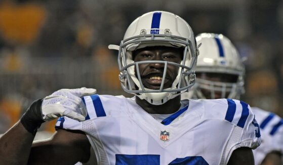 Linebacker Daniel Adongo of the Indianapolis Colts signals during a game against the Pittsburgh Steelers on Dec. 6, 2015, at Heinz Field in Pittsburgh, Pennsylvania.