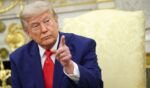 President Donald Trump takes questions from the media Tuesday in the Oval Office of the White House in Washington, D.C.