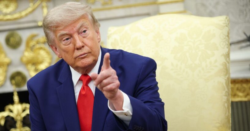 President Donald Trump takes questions from the media Tuesday in the Oval Office of the White House in Washington, D.C.