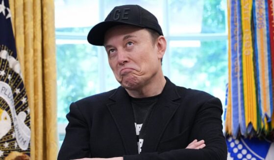 Elon Musk shrugs in the Oval Office in the White House on May 30, 2025.