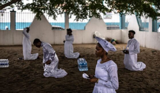 Christians kneel in worship on July 12, 2026 in the Ketu neighborhood of Lagos.