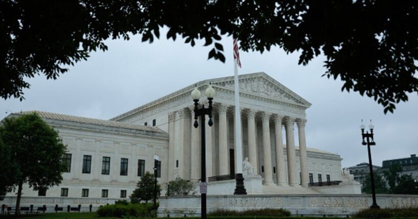 The Supreme Court Building stands in Washington, D.C. as grey clouds fill the sky on June 23, 2026.