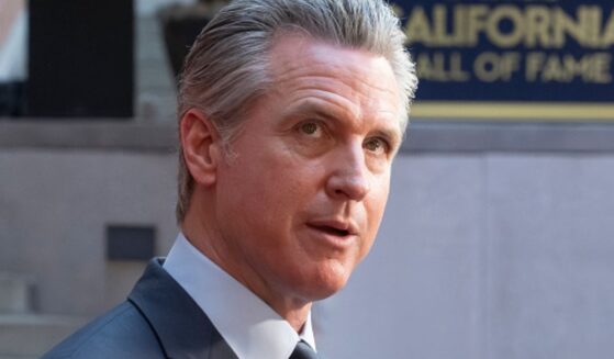 Gavin Newsom looks to photographers at the 19th California Hall of Fame ceremony on March 19, 2026.