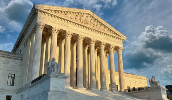 The Supreme Court Building stands during dawn.