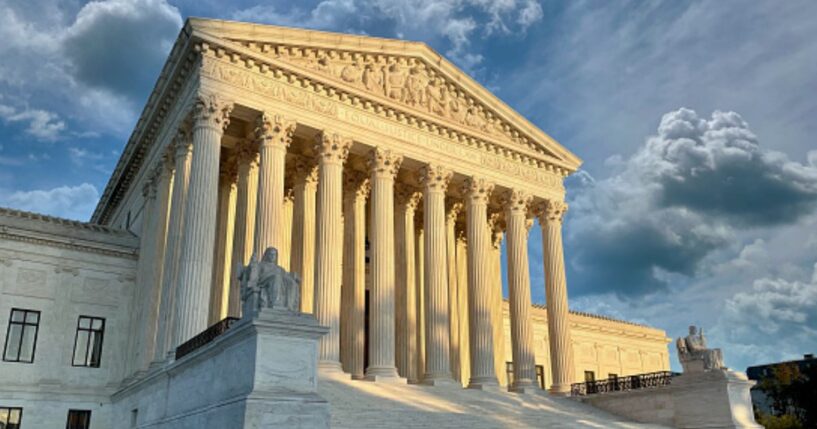 The Supreme Court Building stands during dawn.