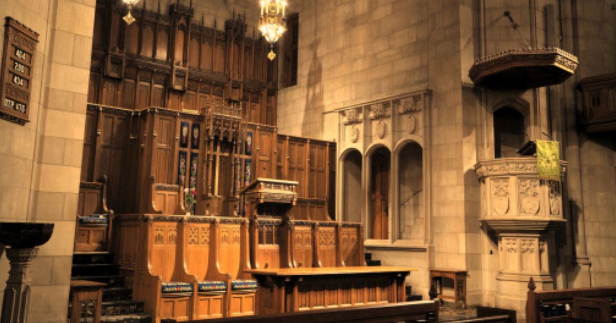 An altar sits in a bright Presbyterian Church hall.