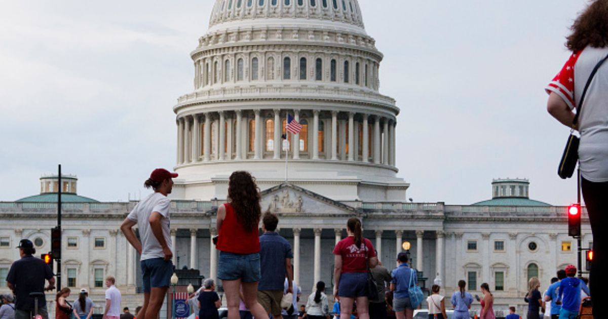 The United States Capitol Building stands as celebrators of America 250 gather in the National Mall on July 4, 2026.