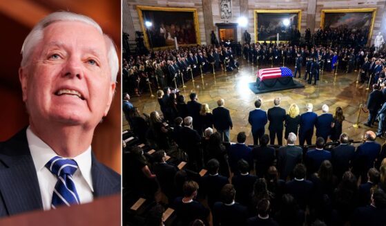 Mourners, right, surround the flag-draped casket Tuesday during a congressional tribute to the late GOP Sen. Lindsey Graham of South Carolina in the Rotunda of the U.S. Capitol in Washington, D.C.