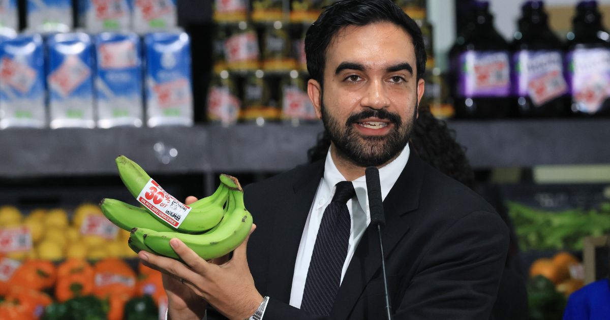 New York City Mayor Zohran Mamdani holds up bananas as he speaks at a food distribution center Monday in the Brooklyn borough of New York City.