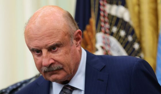 Dr. Phil McGraw looks on at an event in the Oval Office of the White House in Washington, DC on June 26, 2026.