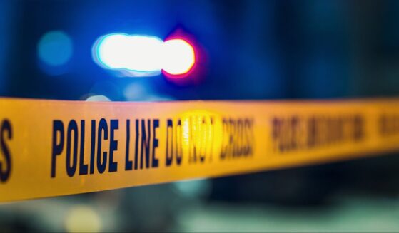 A close-up shot of police tape at a crime scene.
