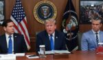 President Donald Trump speaks during a Cabinet meeting Friday at Camp David, the presidential retreat, flanked by Secretary of State Marco Rubio, left, and Secretary of Defense Pete Hegseth, right.