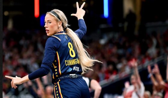 Sophie Cunningham #8 of the Indiana Fever reacts against the New York Liberty on July 18 during the first half at Gainbridge Fieldhouse in Indianapolis, Indiana.