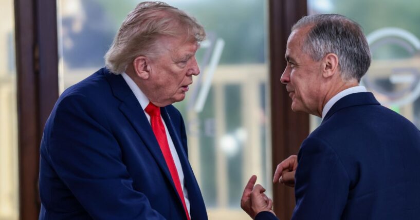President Donald Trump speaks with Canadian Prime Minister Mark Carney at a June meeting. Trump and Carney painted completely different pictures about the tariff situation between their respective countries this week.