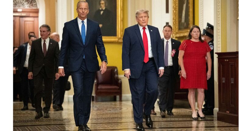 President Donald Trump walks with Senate Majority Leader John Thune of South Dakota on the way to a June 24 lunch meeting with Senate Republicans at the U.S. Capitol in Washington, D.C.