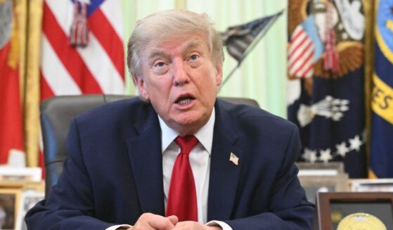 President Donald Trump speaks with reporters after signing a presidential memo on pollution control in vehicles at the Oval Office of the White House in Washington, D.C., on June 29, 2026.
