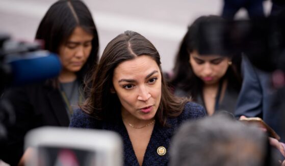 Rep. Alexandria Ocasio-Cortez speaks to members of the media as she arrives for the last votes of the week at the U.S. Capitol Building on May 21, 2026, in Washington, D.C.