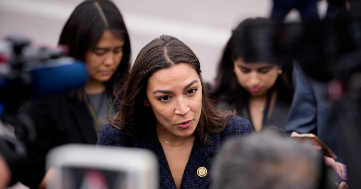 Rep. Alexandria Ocasio-Cortez speaks to members of the media as she arrives for the last votes of the week at the U.S. Capitol Building on May 21, 2026, in Washington, D.C.