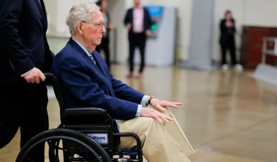 Sen. Mitch McConnel is pushed in a wheelchair through the Senate Subway during the Senate War Powers vote on April 22, 2026, in Washington, D.C.