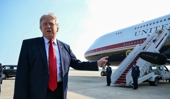 President Donald Trump speaks to the press before he boards Air Force One for his first flight aboard the Boeing 747-8 that Qatar gifted the United States to use for executive travel, at Joint Base Andrews, in Maryland, on July 1, 2026.