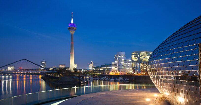 Düsseldorf Media Harbor at night in Germany.