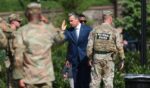 Secretary of War Pete Hegseth greets members of the U.S. National Guard after an event at Meridian Hill Park on July 2, 2026, in Washington, D.C.