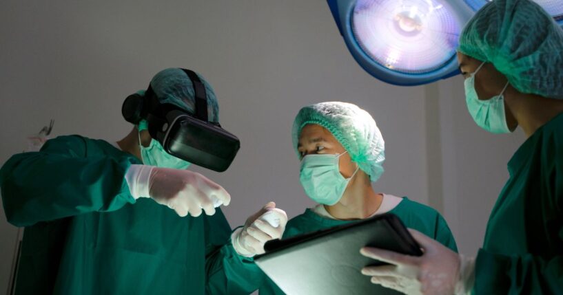 Doctors in surgery in an operating room.
