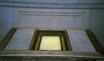 The Declaration of Independence, displayed in a dimly lit hall at the National Archives, reserved for the original Charters of Freedom in Washington, D.C.